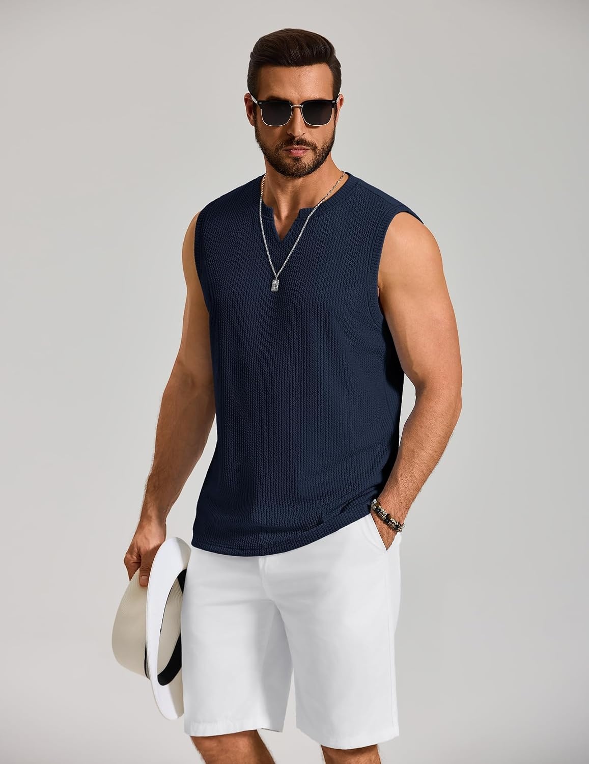 image:imageCOOFANDY Mens Casual Tank Top V Neck Knit Jacquard Summer Sleeveless Shirts Lightweight 3D Textured TankPerfect for Beach VacationBreathable and StretchableResort Wear or Retro Street StyleNavy Blue