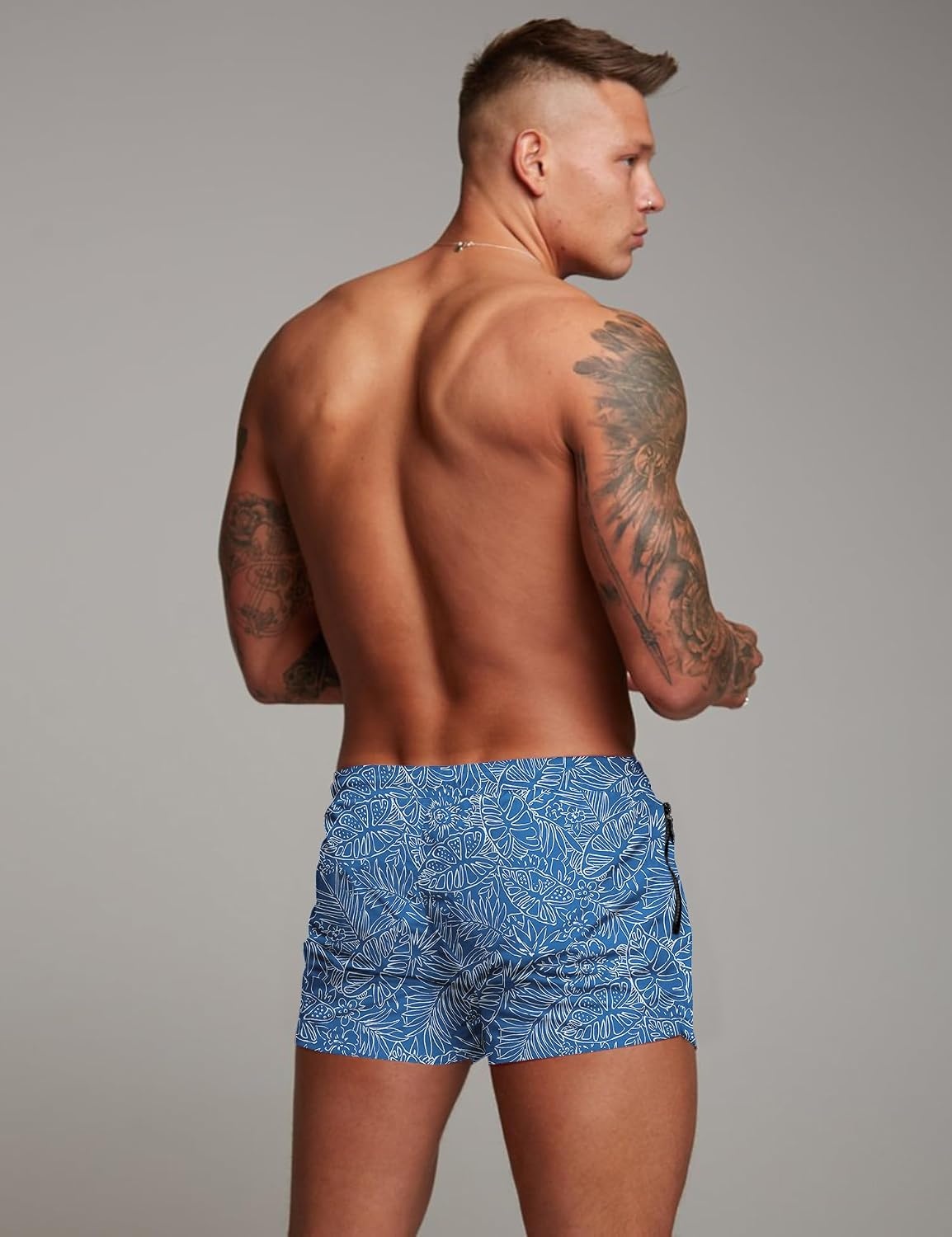 image:imageCOOFANDY Mens Swim Trunk Quick Dry Swimwear Mesh Lining Bathing Suit Two Zippered Pockets Drawstring Swim Shorts for Beach Vacation Party Cruise and Daily Casual WearLight Blue Leaves