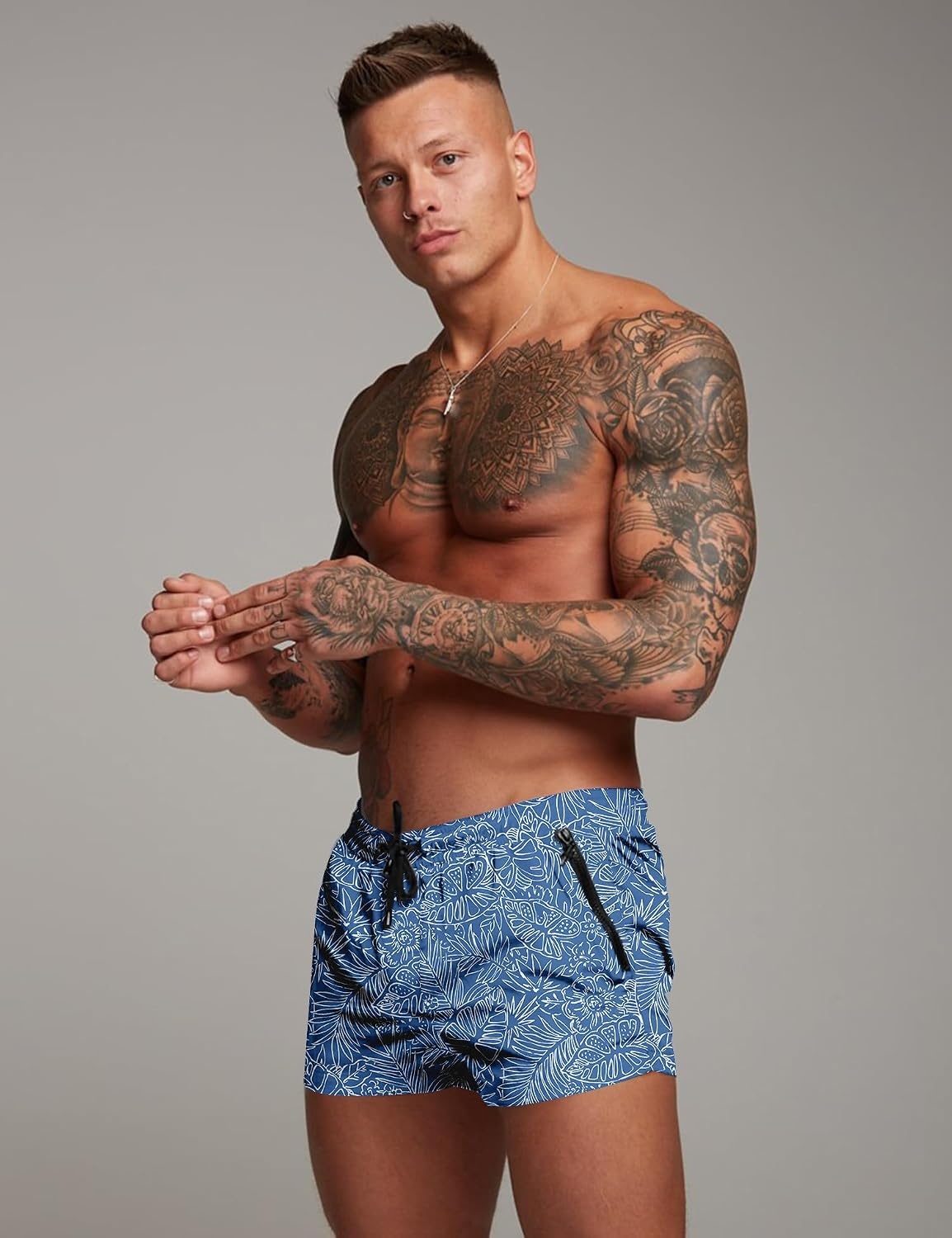 image:imageCOOFANDY Mens Swim Trunk Quick Dry Swimwear Mesh Lining Bathing Suit Two Zippered Pockets Drawstring Swim Shorts for Beach Vacation Party Cruise and Daily Casual WearLight Blue Leaves